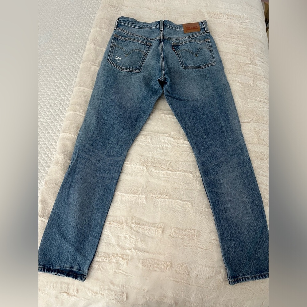 Levi’s 501 ripped jeans